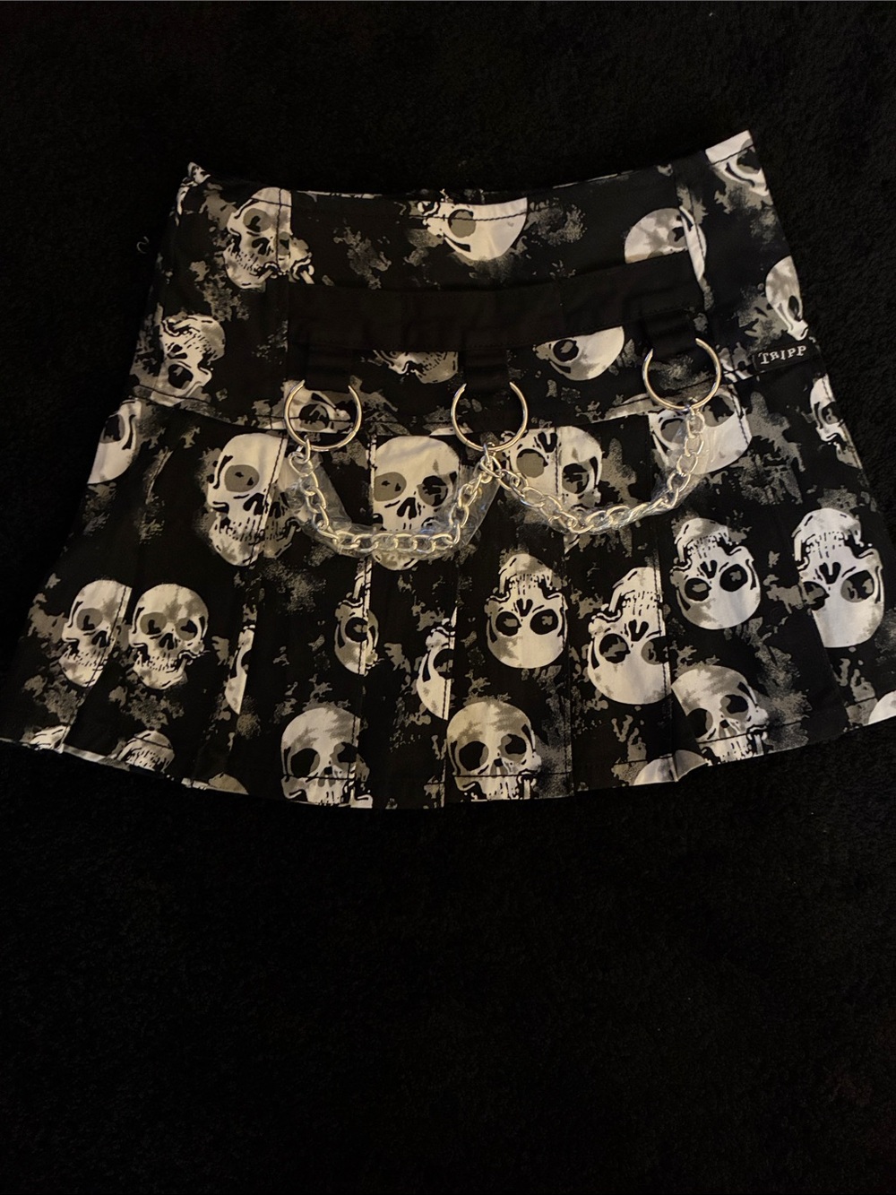 Tripp NYC Black and White Skull Print Mini Skirt with Chains measures 28”